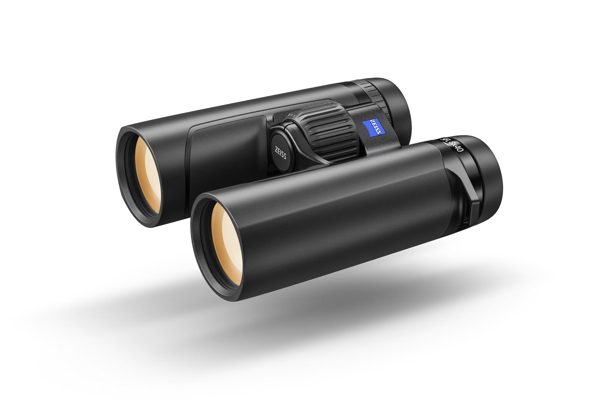 Black ZEISS SFL 8x40 binoculars with a central focus wheel and blue ZEISS logo on a white reflective surface.