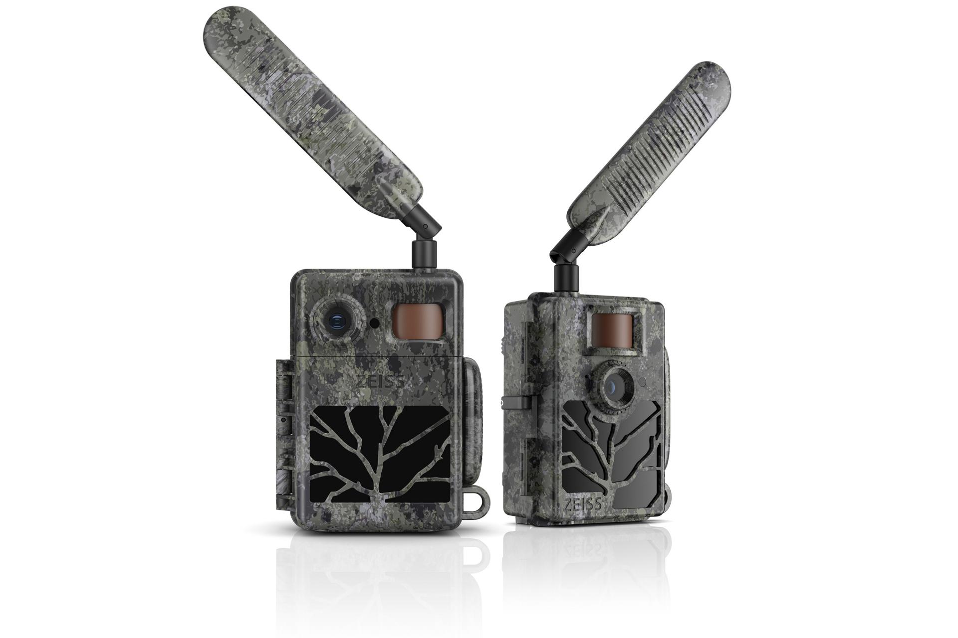 Two ZEISS trail cameras with camouflage design and extended antennas, shown from front and side views.