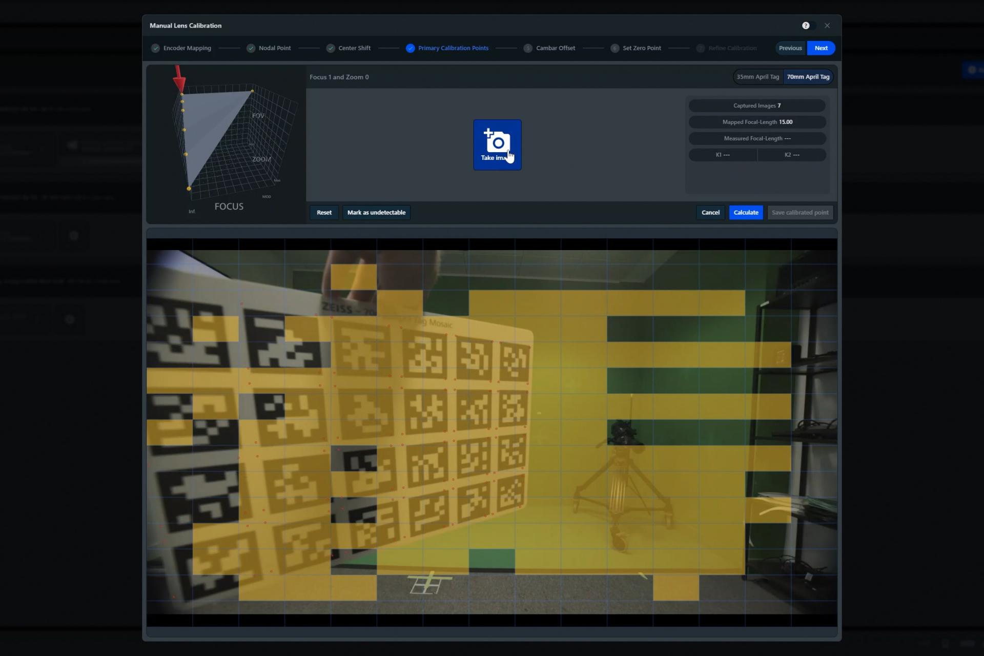 Screenshot of a ZEISS software interface displaying a 3D calibration setup with a camera positioning tool and calibration markers overlaid on a workspace.
