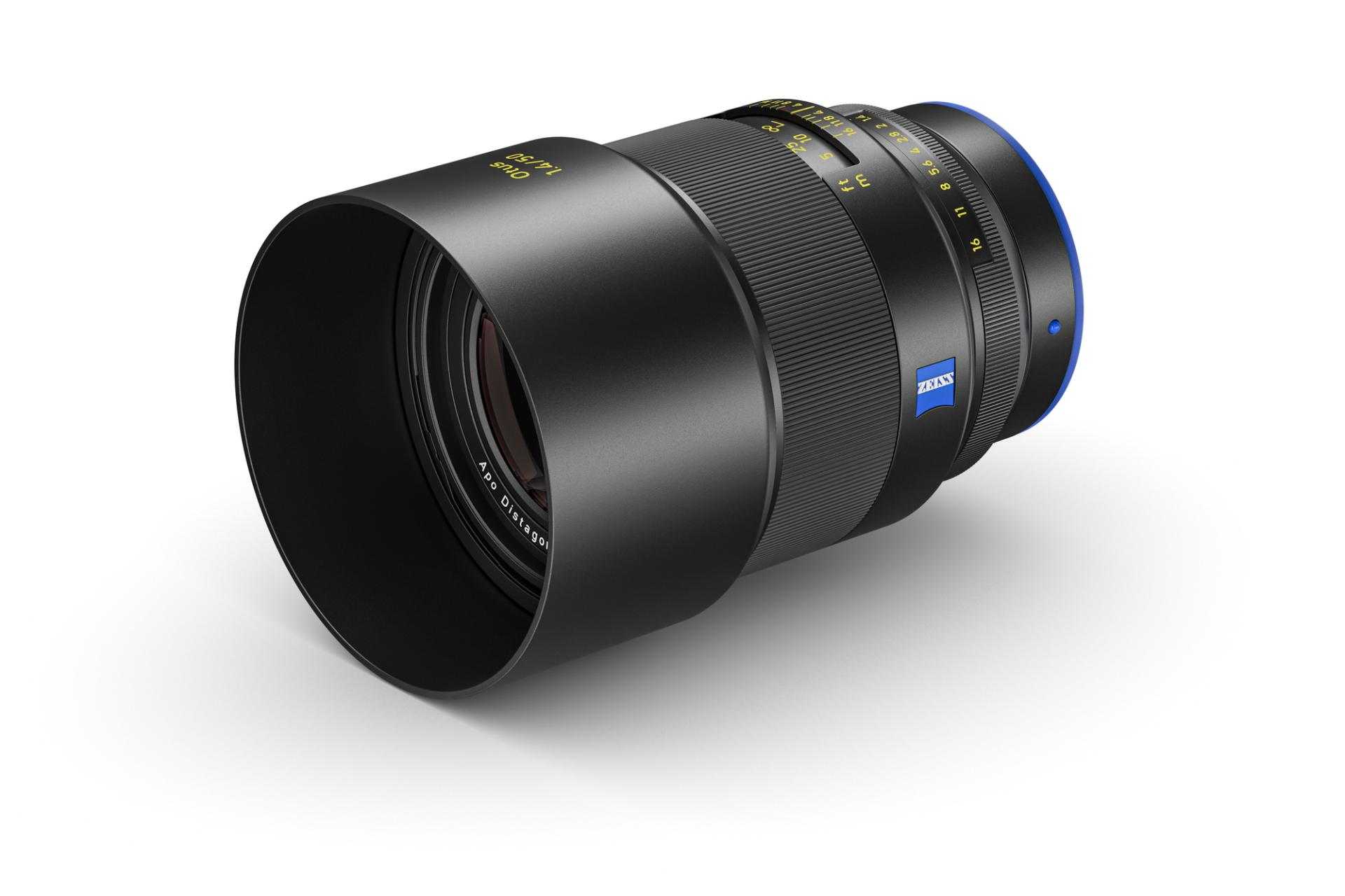 Black ZEISS camera lens with a lens hood, featuring a ZEISS logo and focus ring, displayed on a white background.