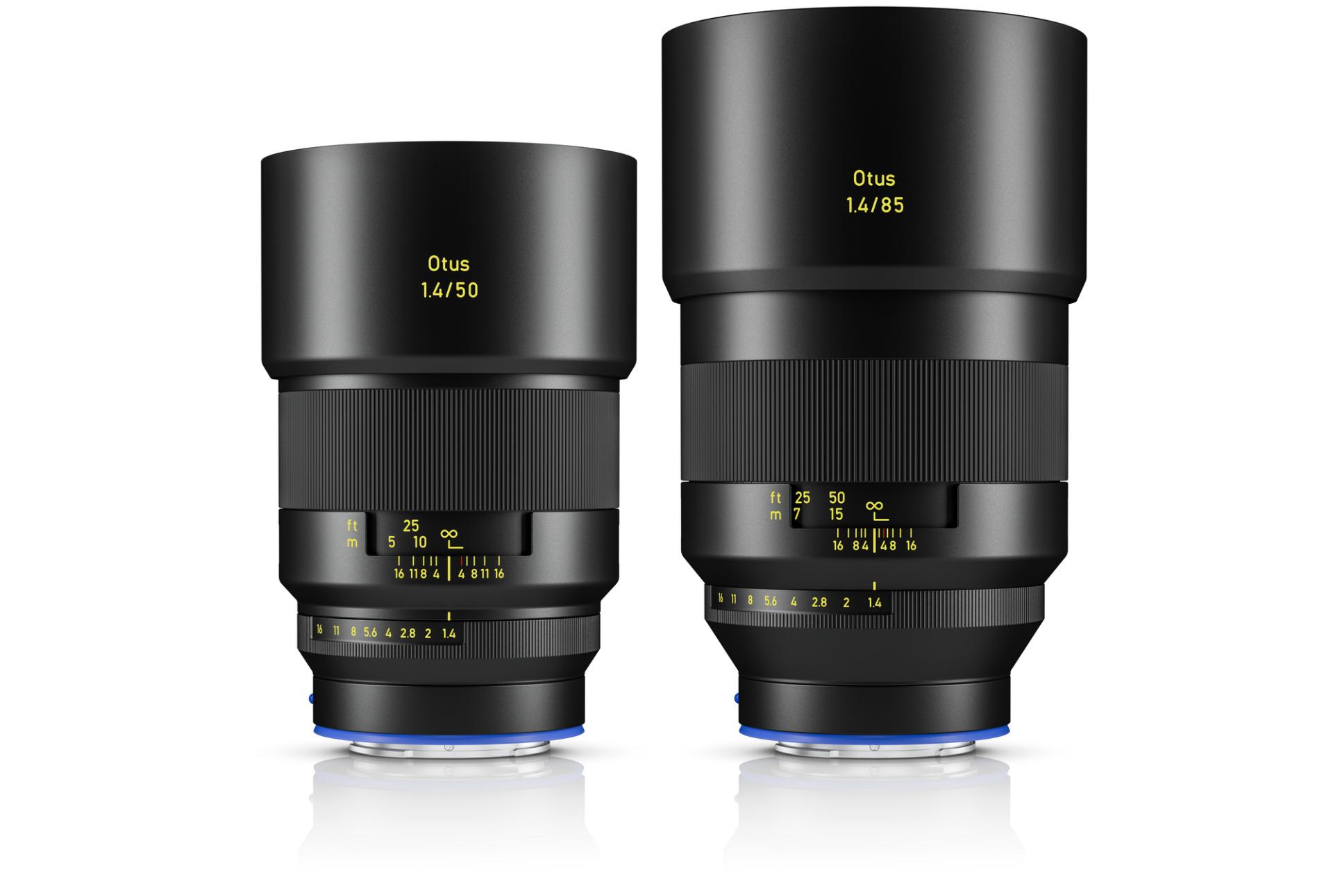 Two ZEISS Otus camera lenses, a 1.4/50 and a 1.4/85, are standing side by side against a white background.