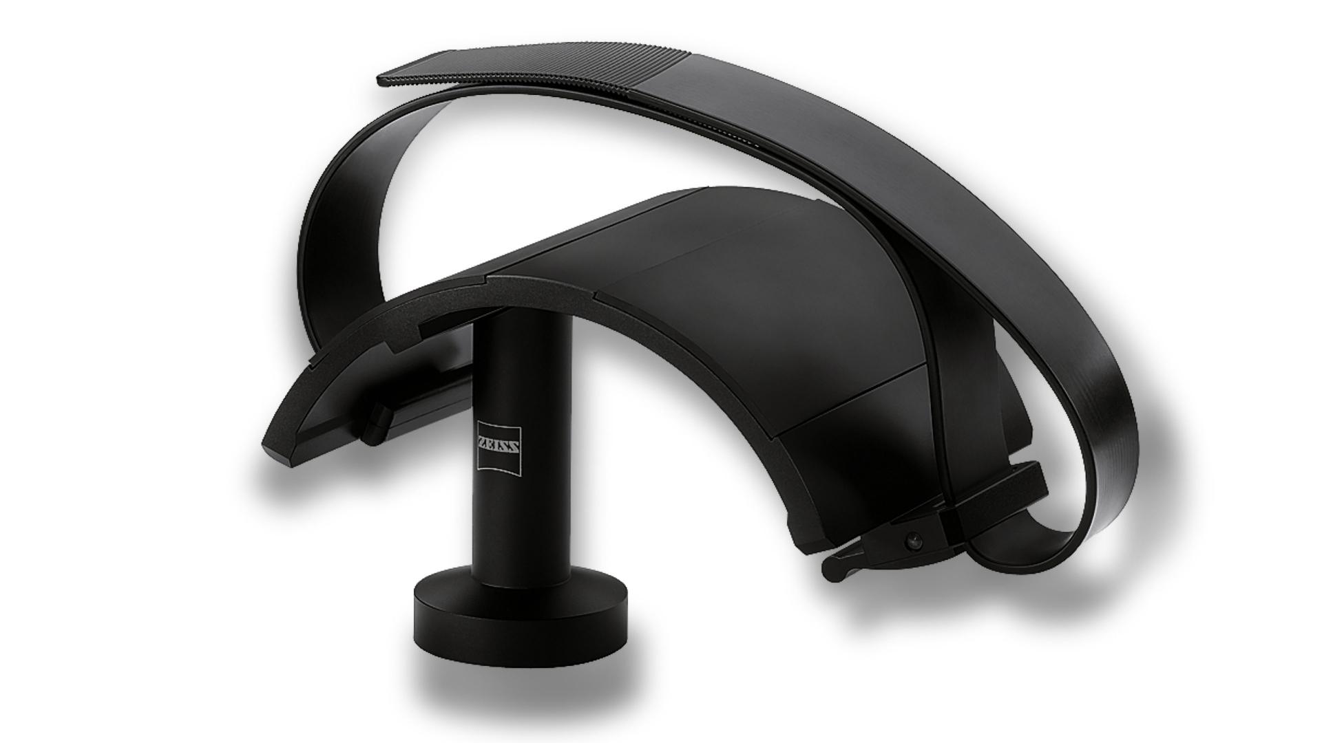 Black ZEISS tripod device with a curved, modern design mounted on a cylindrical base.