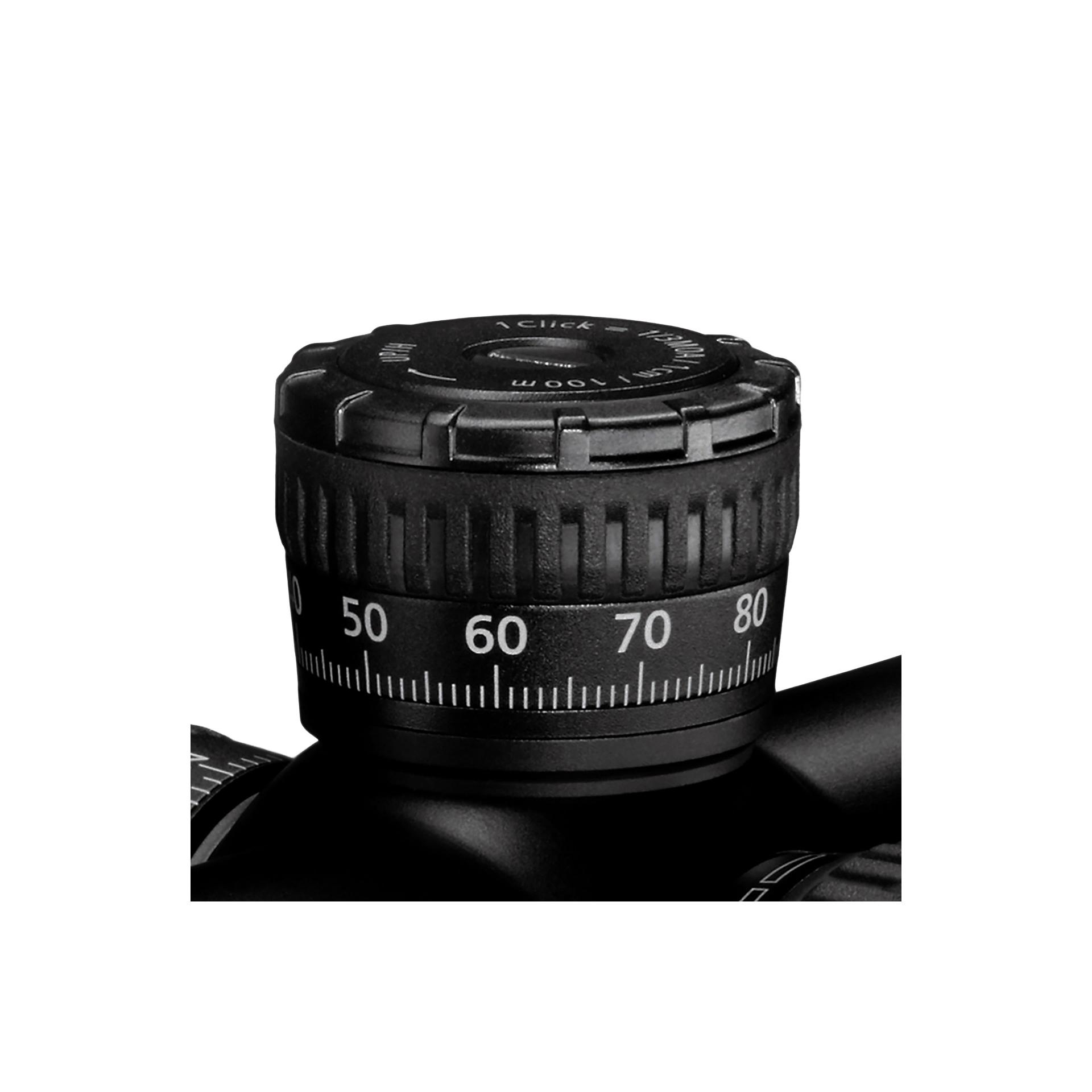 Close-up view of a ZEISS riflescope elevation turret with numbered adjustment markings and detailed labeling.