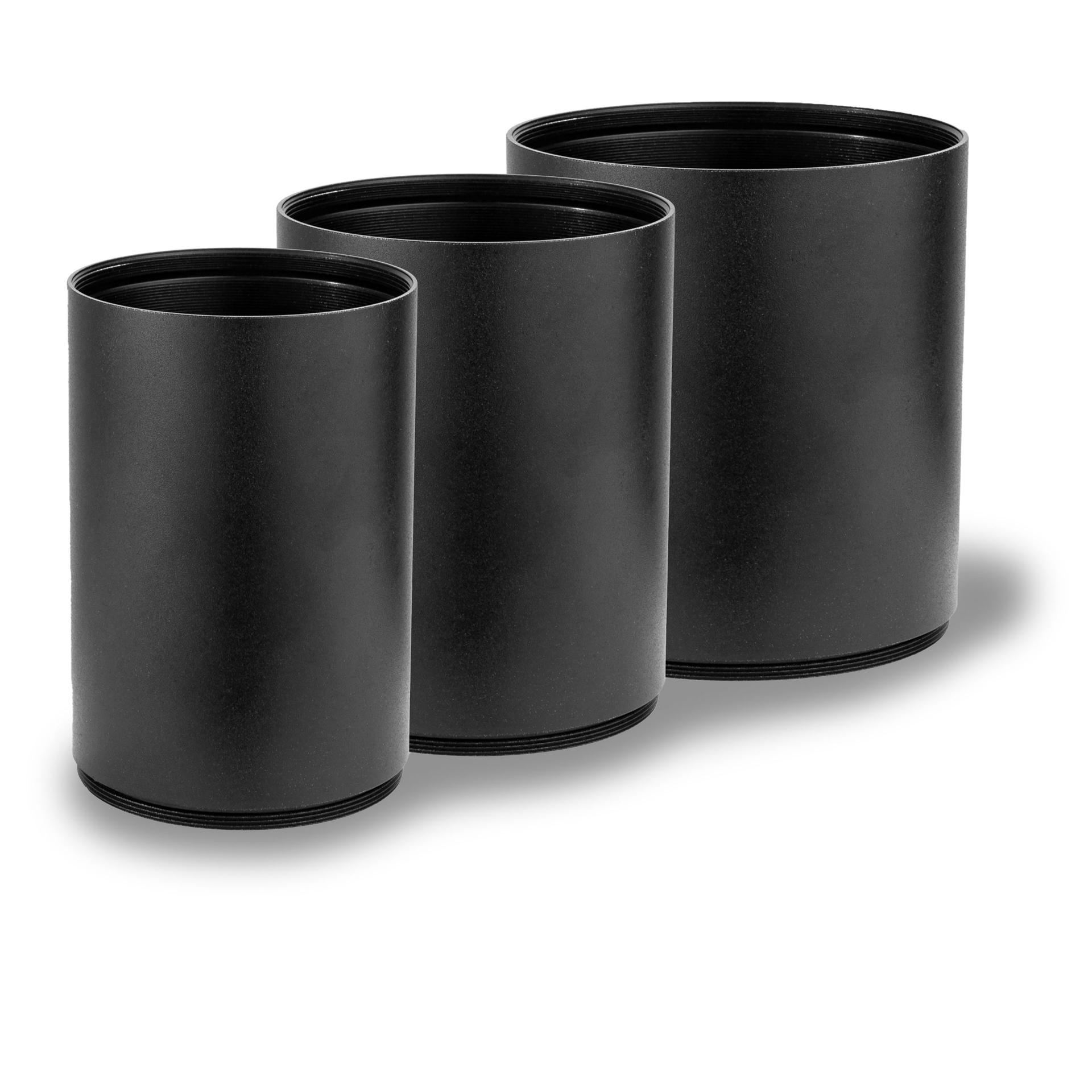 Three black cylindrical ZEISS extension tubes of varying heights arranged side by side on a white background.