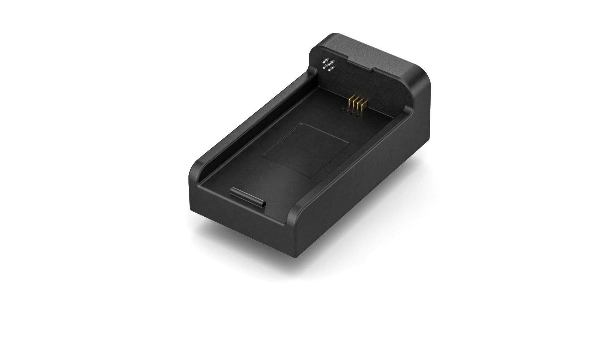 Black rectangular ZEISS battery charging cradle with gold contact pins and a compact design.