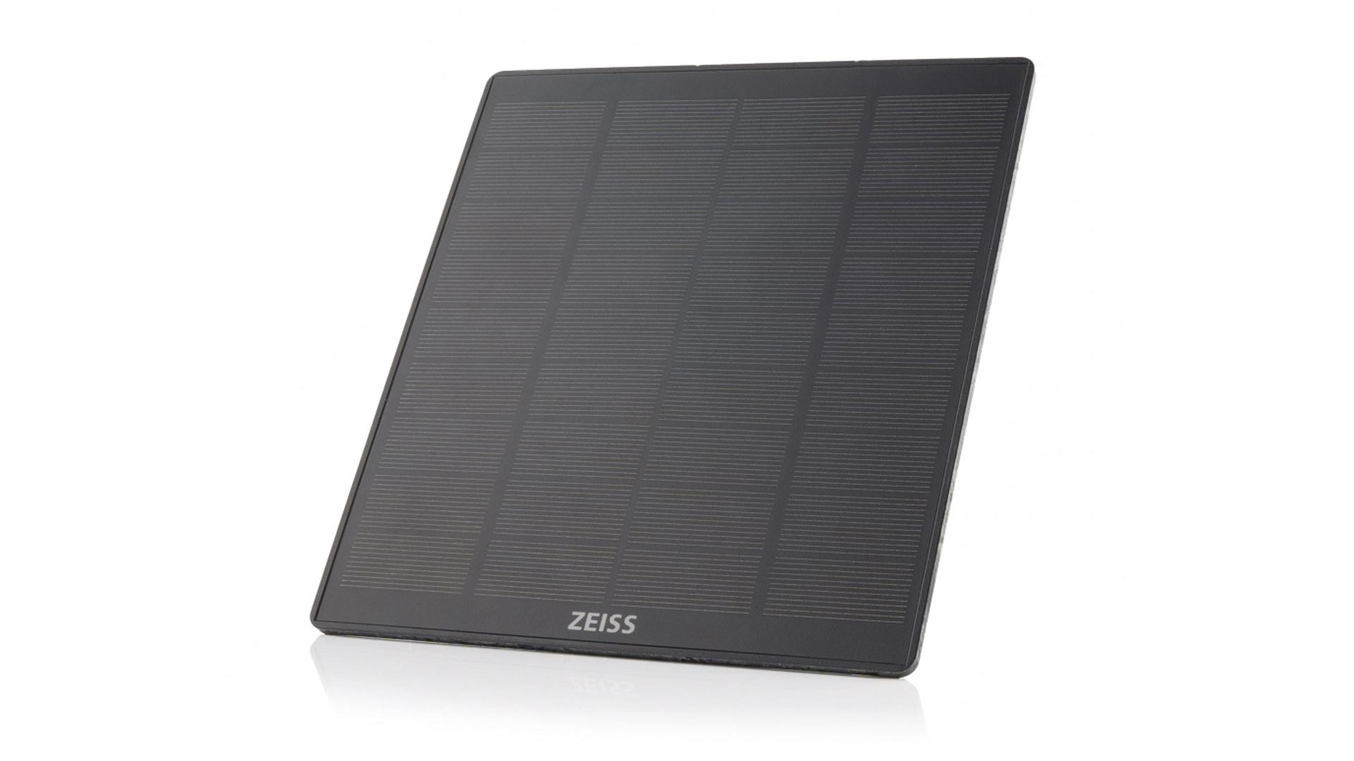 Black rectangular solar panel with a grid pattern, featuring the ZEISS logo at the bottom center.