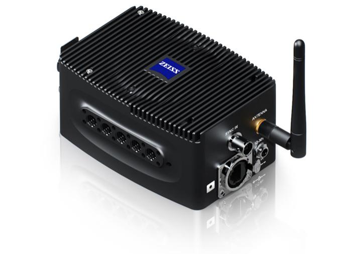 Black ZEISS industrial device with ribbed surface, multiple connection ports, and an external antenna on a white background.