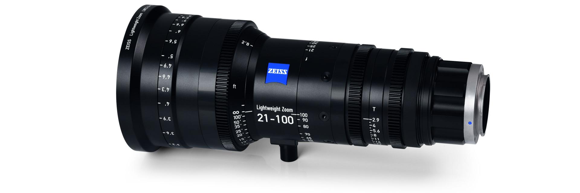 Professional camera lens labeled "ZEISS Lightweight Zoom 21-100" with detailed focal length and aperture markings.