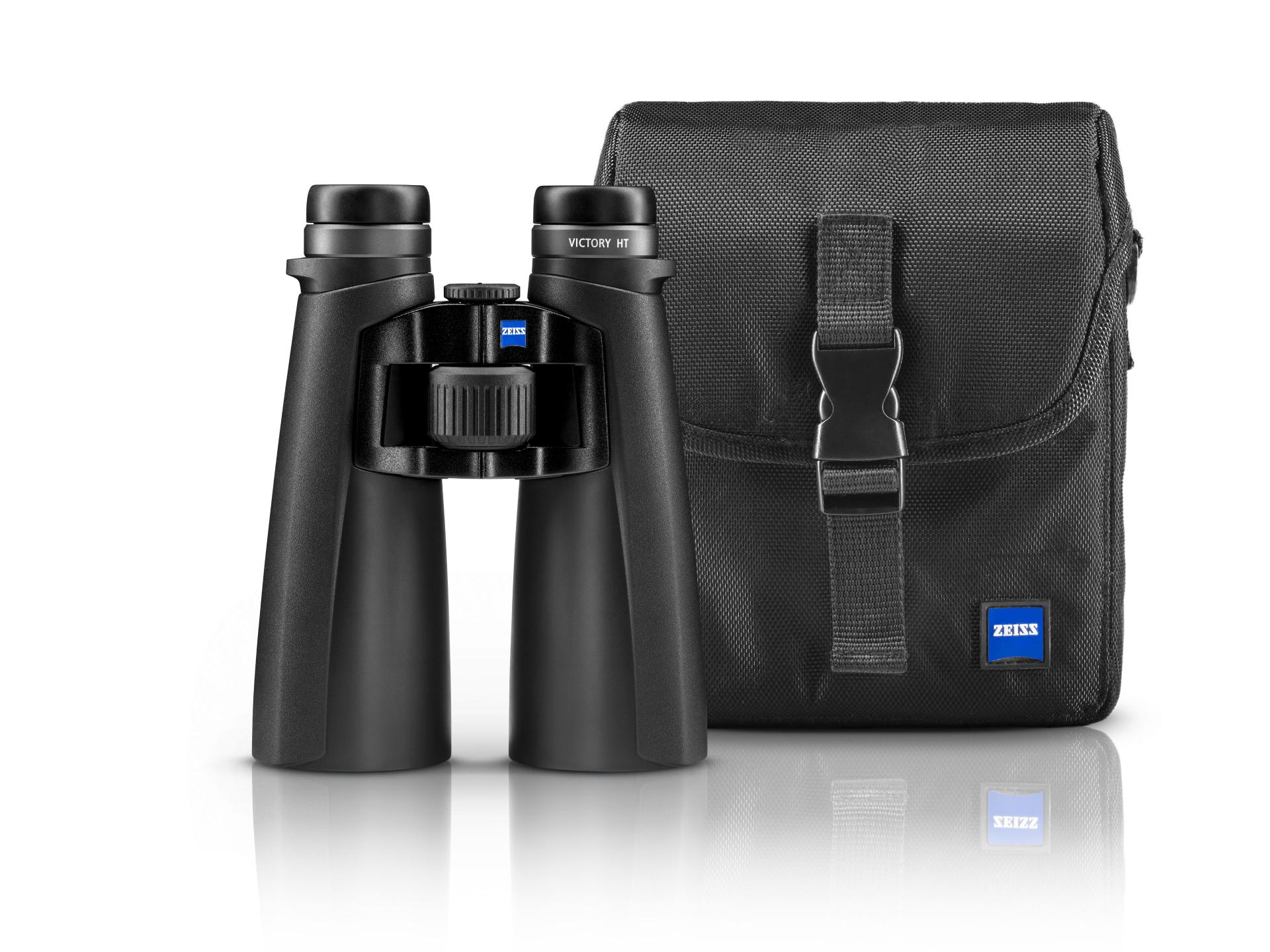 Black ZEISS VICTORY HT binoculars displayed upright next to a matching black carrying case with the ZEISS logo.