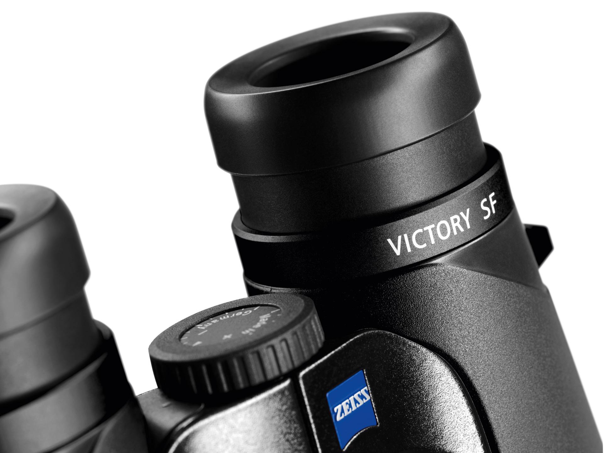 Close-up of a pair of ZEISS VICTORY SF binoculars showing the eyepiece, focus wheel, and ZEISS logo.