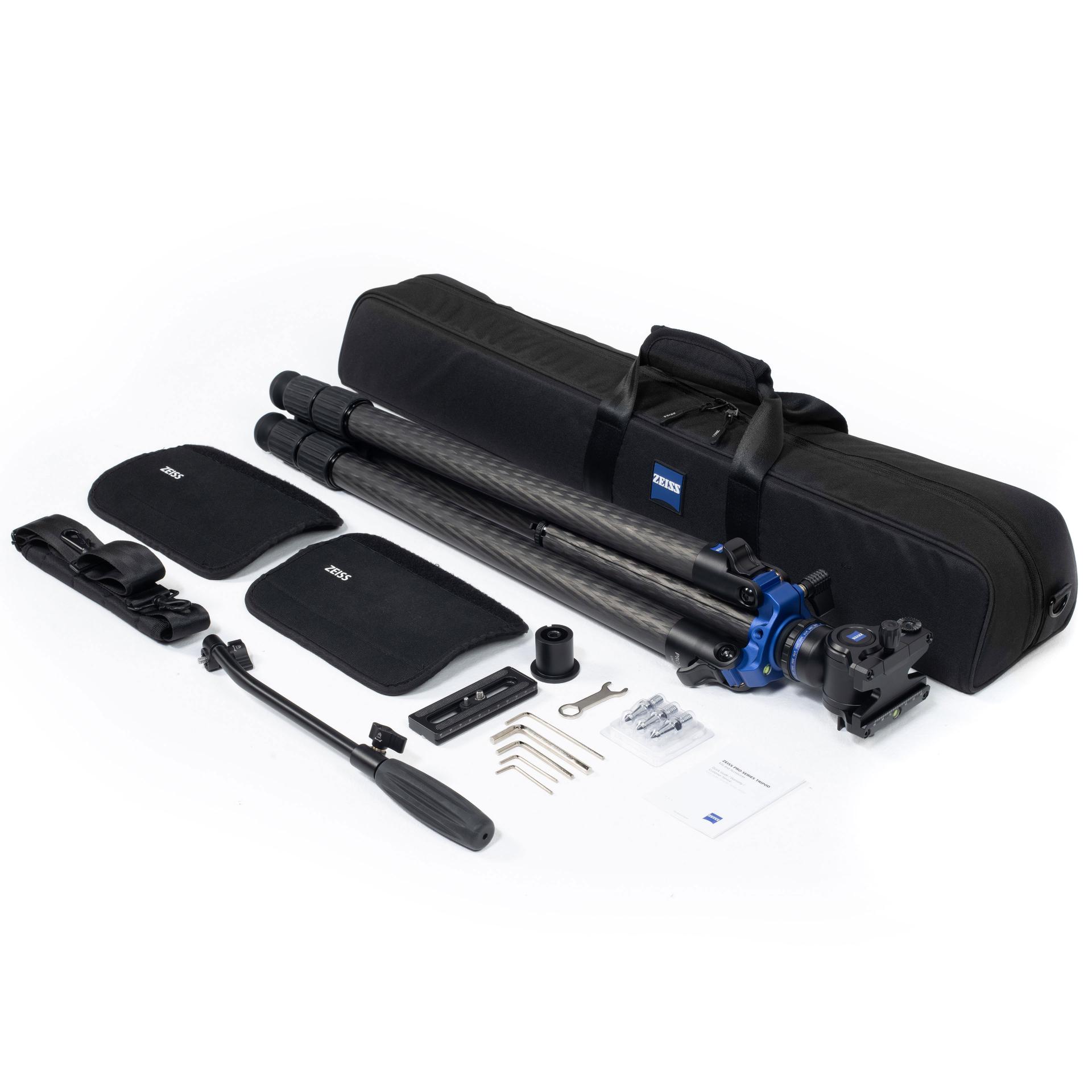 Professional ZEISS tripod kit including carbon fiber tripod, fluid head, carrying case, quick-release plate, handle, tools, and accessories, all neatly arranged on a white background.