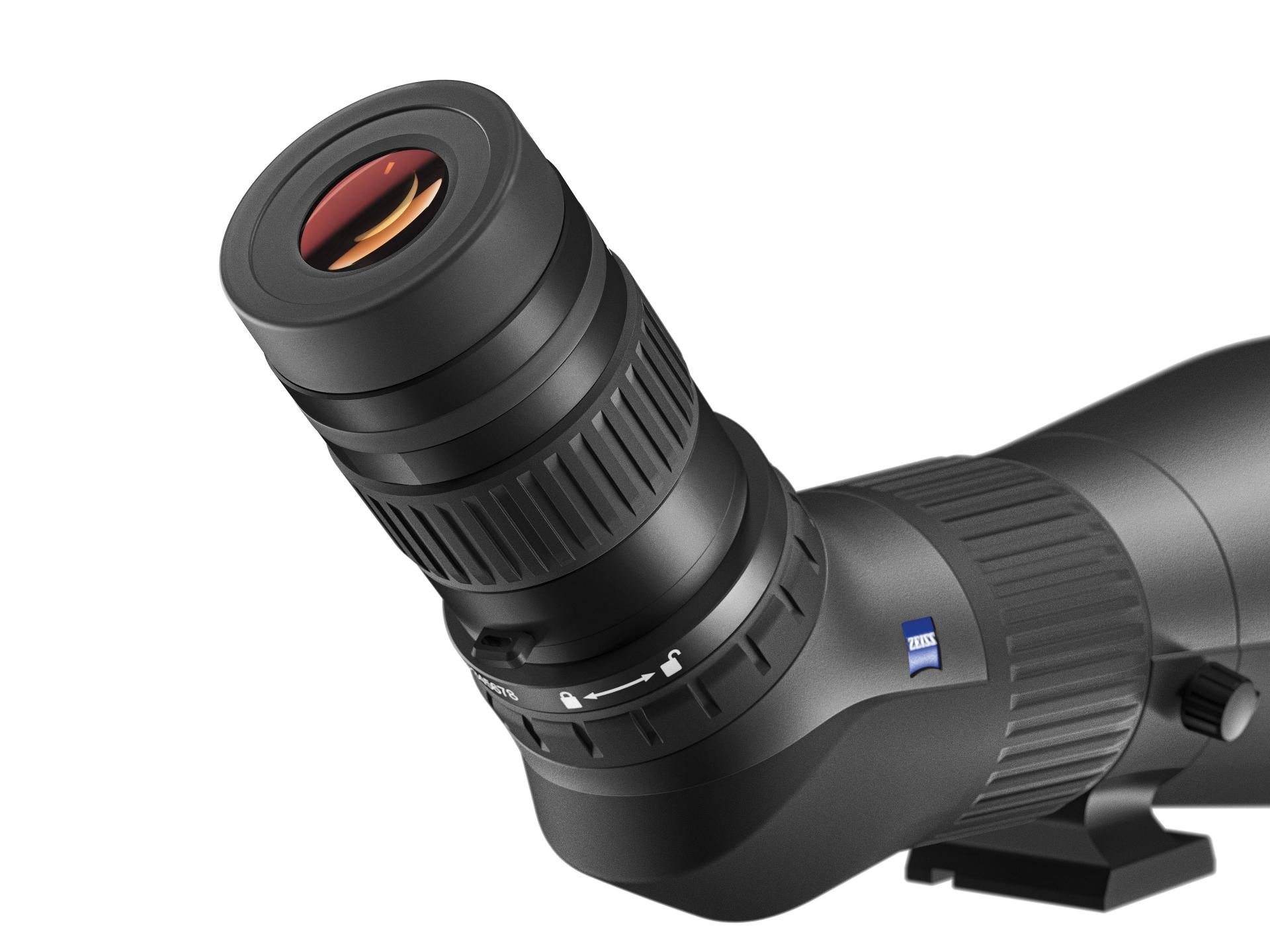 Angled close-up view of a black ZEISS spotting scope with a focus ring and visible ZEISS logo.