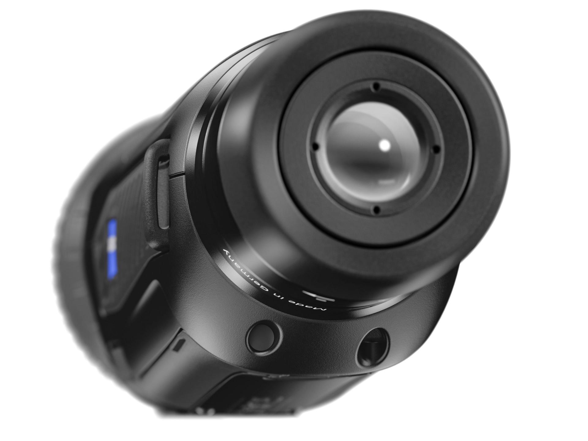 Close-up view of a high-precision ZEISS optical device featuring a large lens and control buttons on a sleek black body.