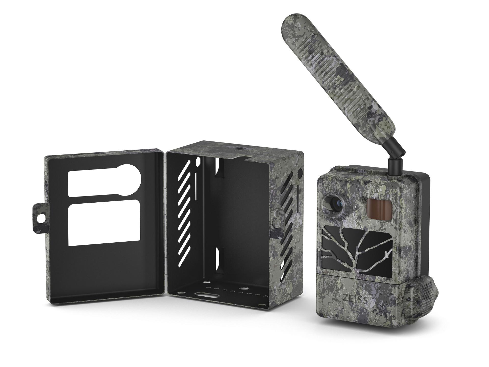 Camouflaged ZEISS trail camera with a large external antenna shown next to an open protective metal housing.