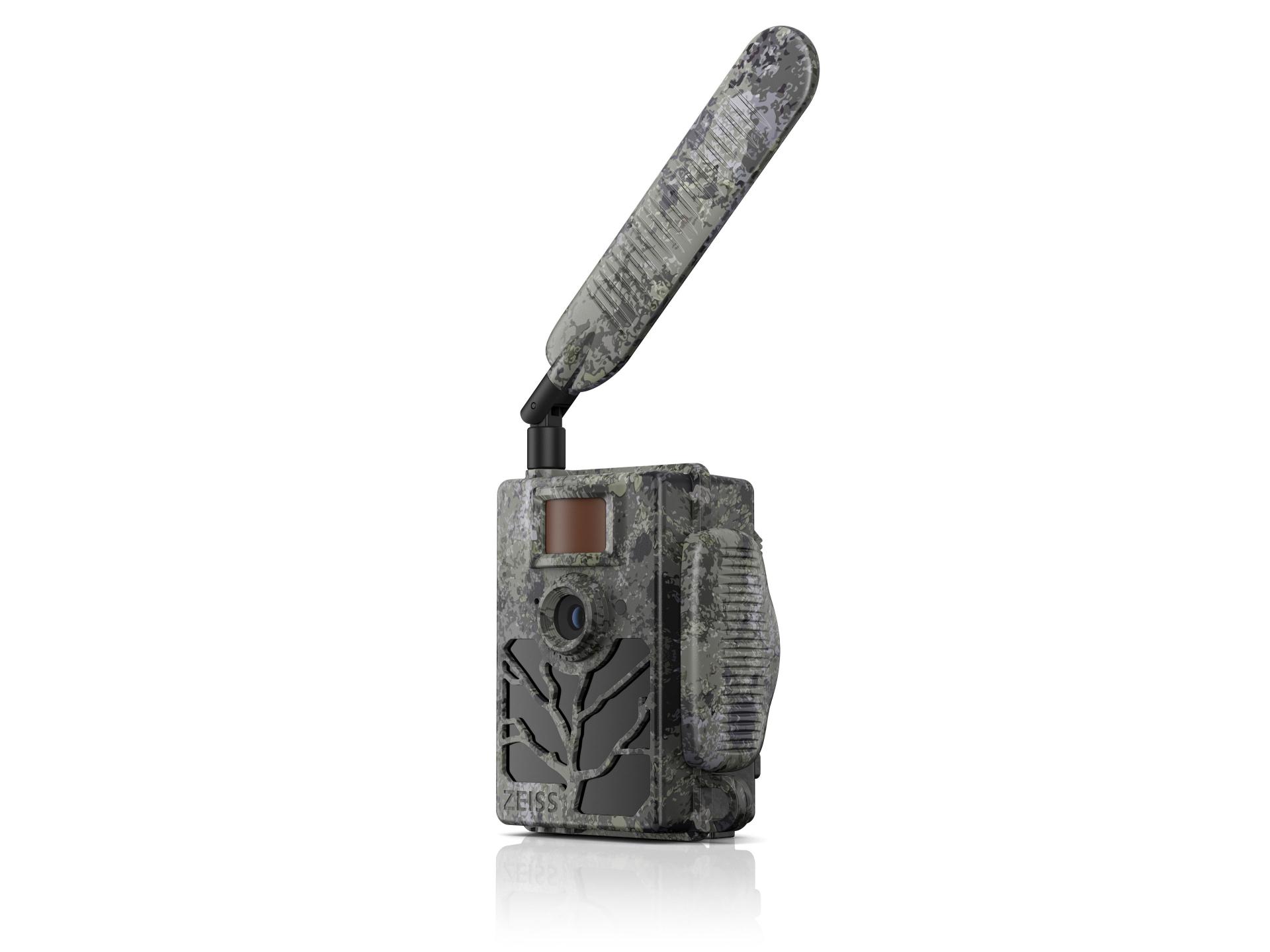 Camouflage-patterned ZEISS trail camera with an extended antenna, front-facing lens, and side-mounted infrared sensor.