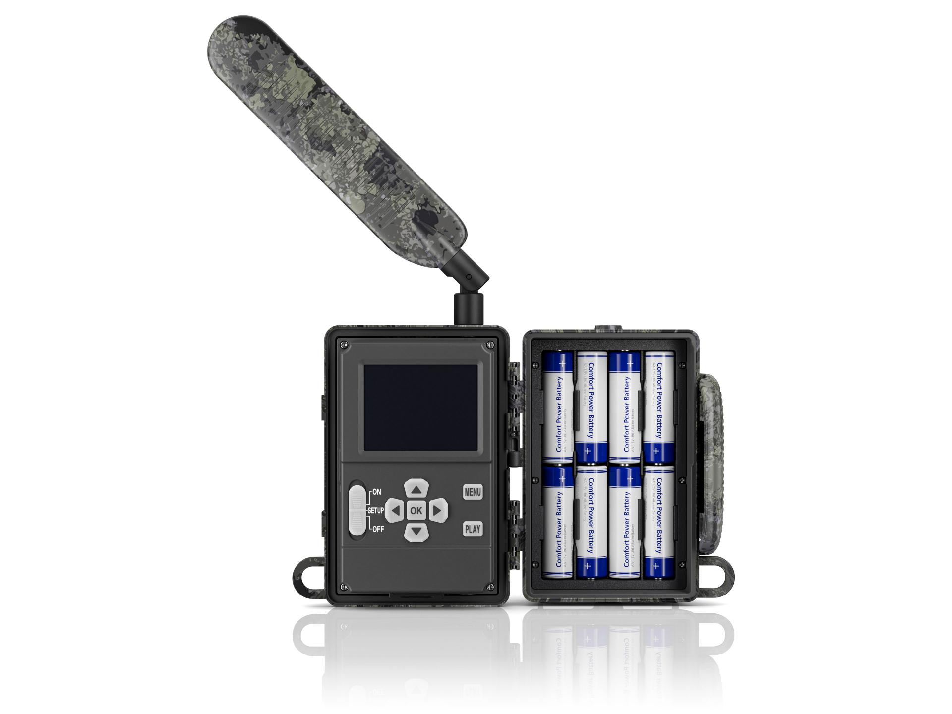 A ZEISS trail camera with an open casing showing control buttons, a display screen on the left, and battery compartments filled with ZEISS-branded batteries on the right.