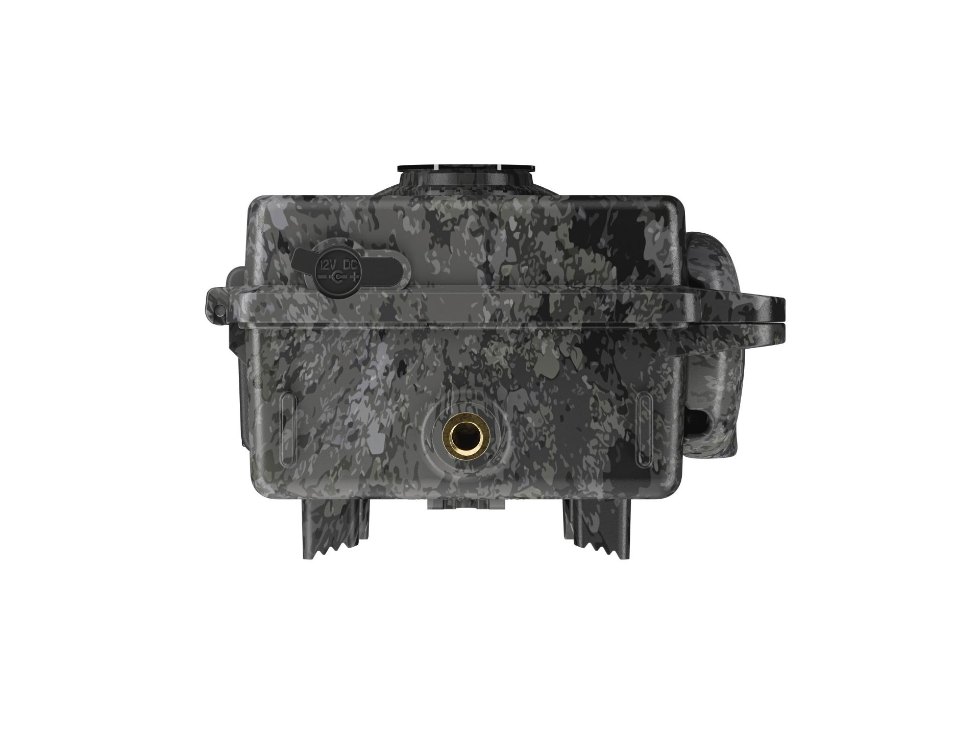 Front view of a camouflaged ZEISS trail camera showing a central mounting socket and control button.