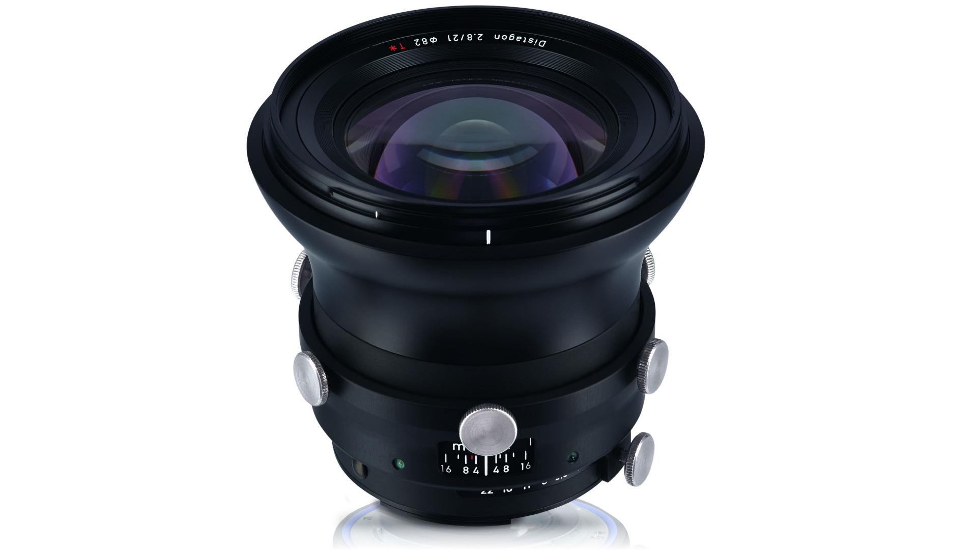 ZEISS wide-angle camera lens with manual control knobs and focus scale markings.