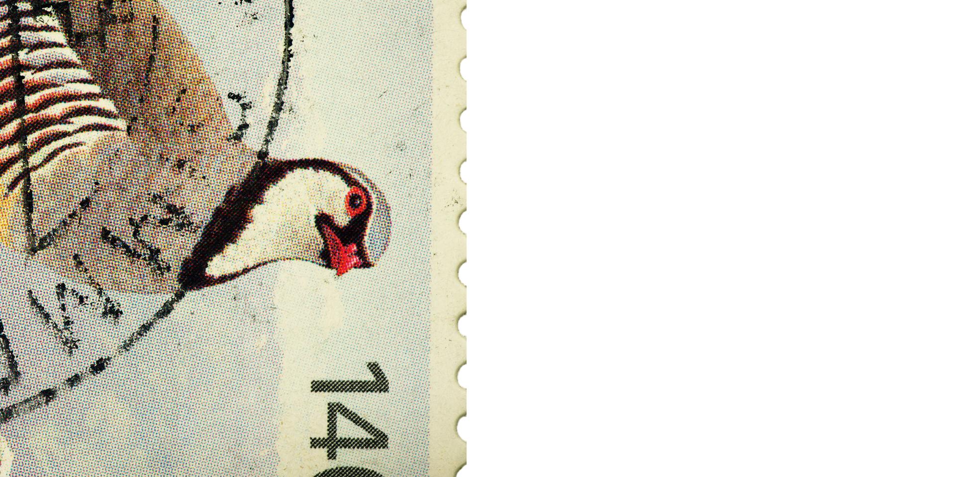 Close-up image of a postage stamp showing part of a bird's head and the number "140" with visible print dots, demonstrating ZEISS optical clarity.