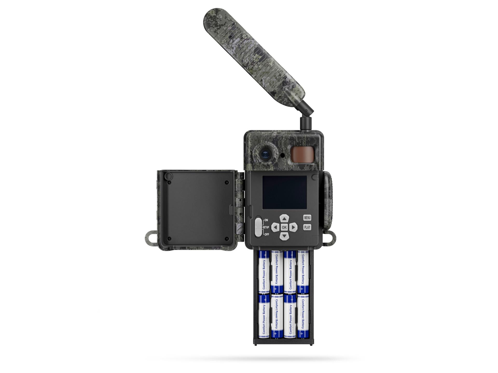 Open ZEISS trail camera with extended antenna, visible control panel, battery compartment filled with AA batteries, and side access door.