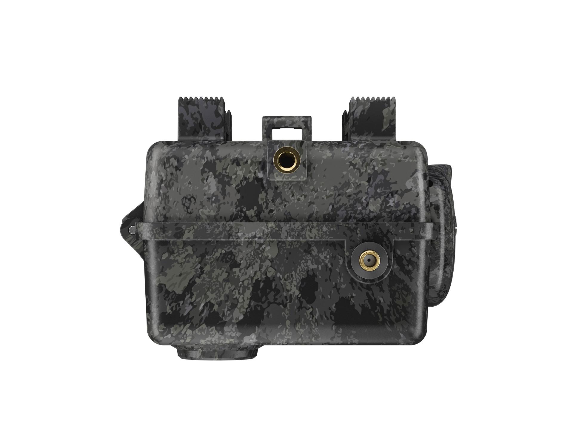 View of a rugged, camouflaged ZEISS outdoor camera housing with two visible lens openings and a latch mechanism.
