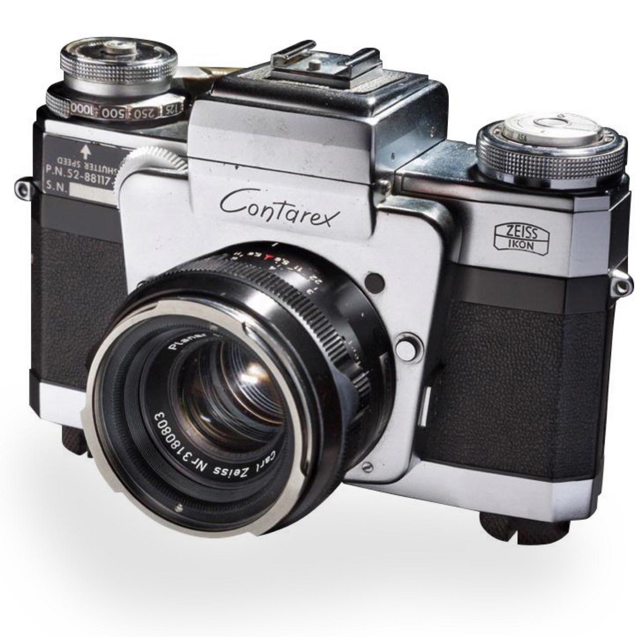 Classic ZEISS Contarex film camera with a ZEISS Planar 50mm f/2 lens, featuring a robust metal body and vintage design elements.