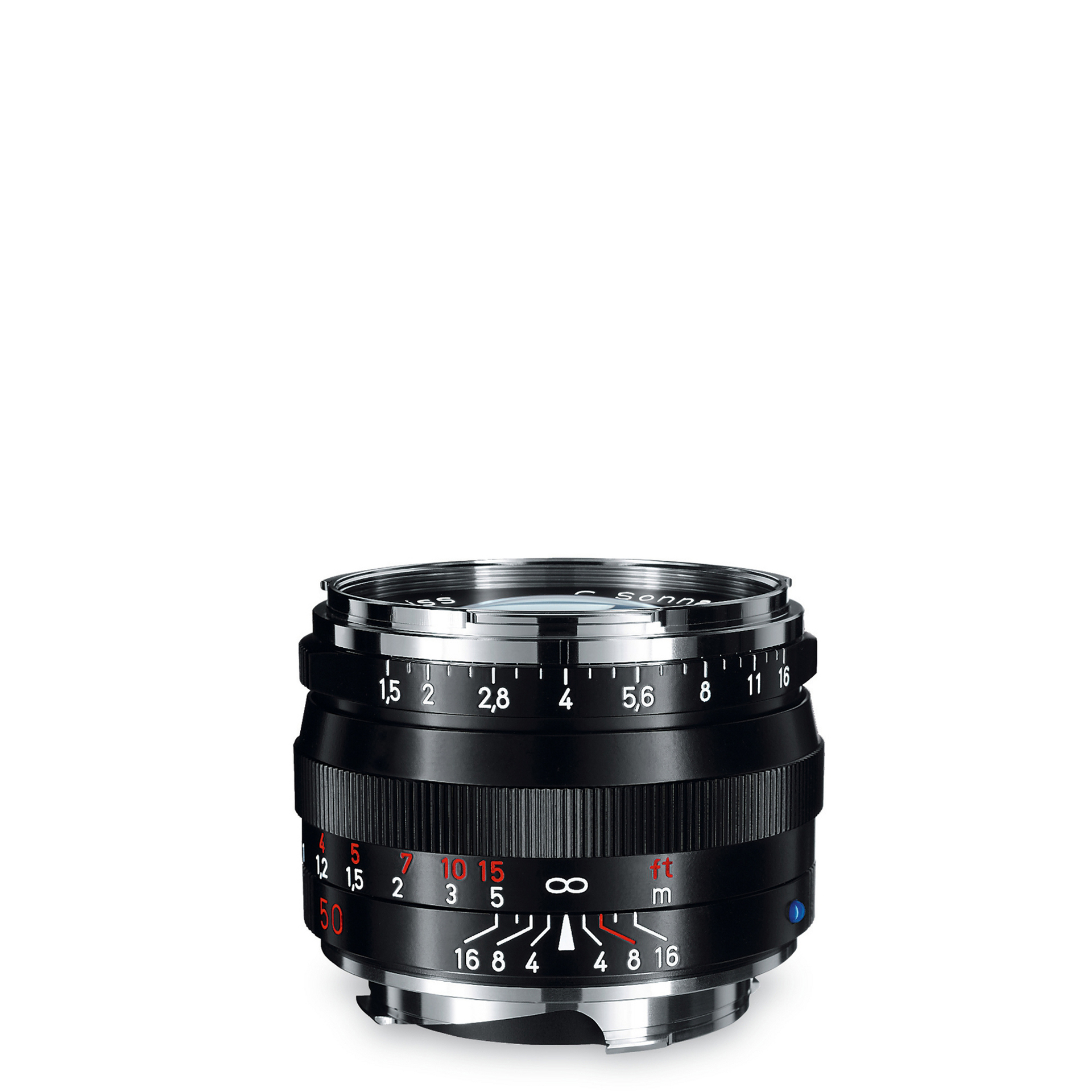 Black ZEISS camera lens with manual focus and aperture control rings, featuring engraved distance and f-stop markings in white and red.