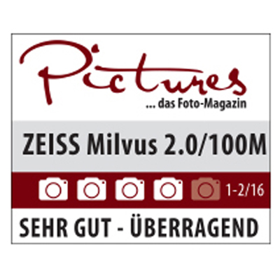 Award badge from "Pictures – das Foto-Magazin" showing a rating of 4.5 out of 5 cameras for the ZEISS Milvus 2.0/100M lens with the verdict "SEHR GUT – ÜBERRAGEND".