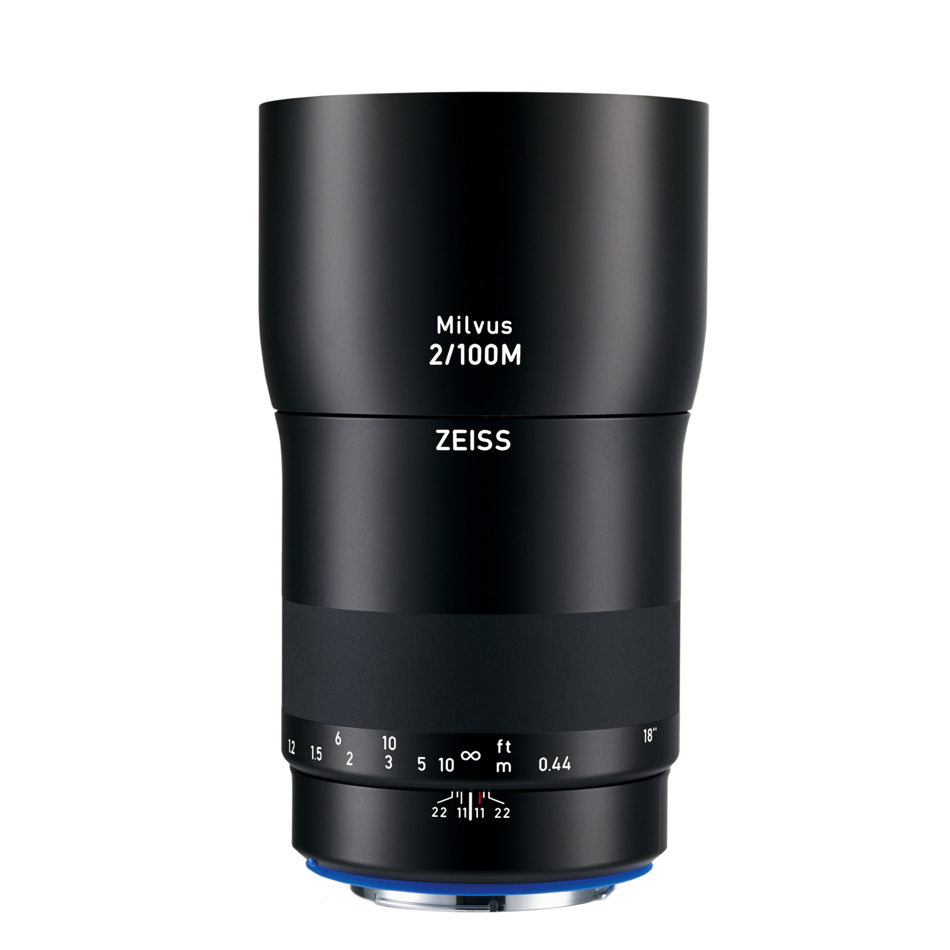 Black ZEISS Milvus 2/100M camera lens standing upright with visible focus and aperture markings.
