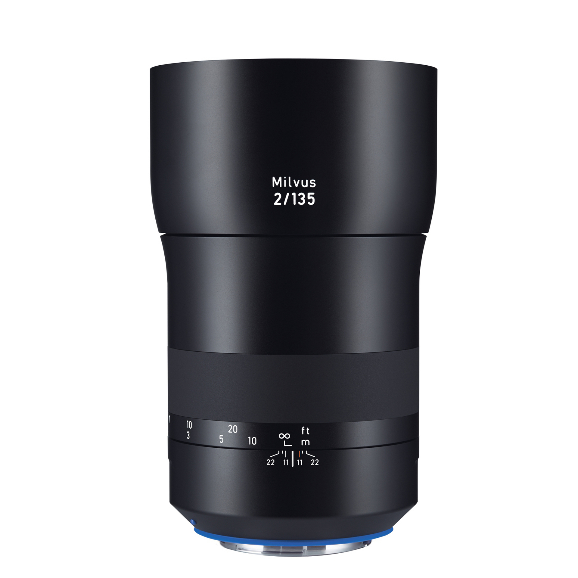 Black ZEISS Milvus 2/135 camera lens standing upright with visible focus and aperture markings.
