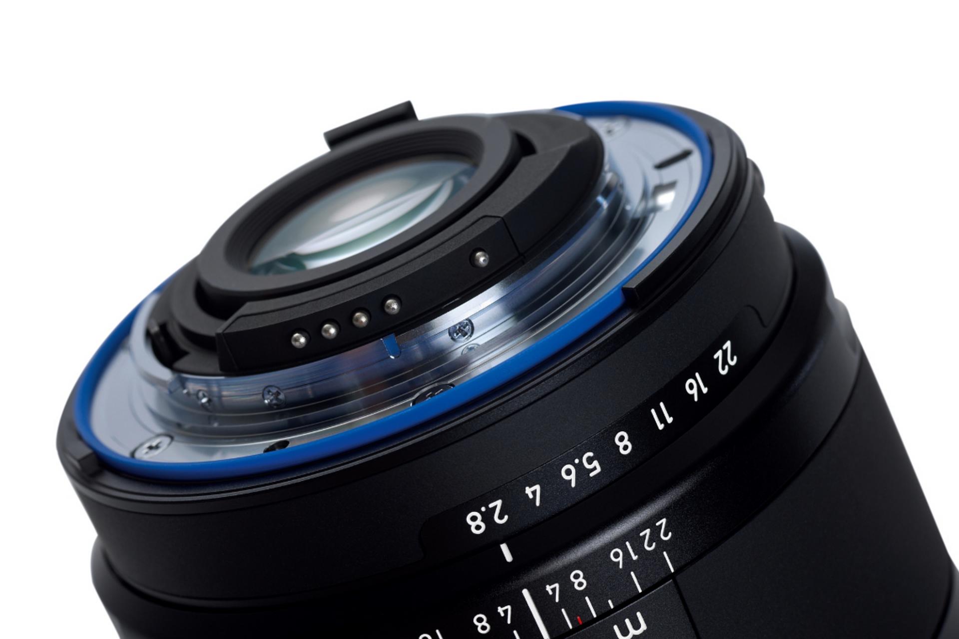 Close-up view of the rear element and aperture markings on a ZEISS camera lens.