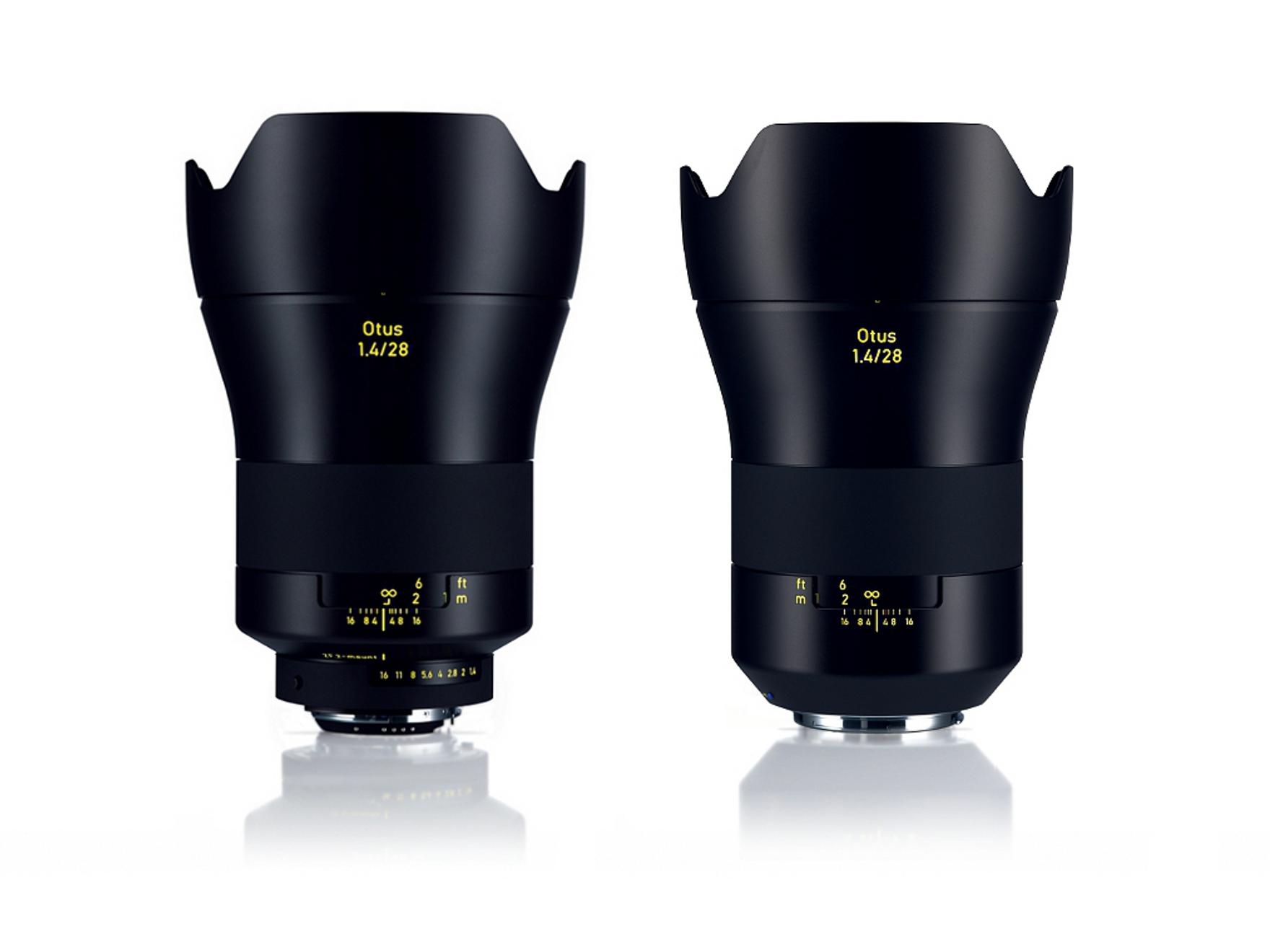 Two black ZEISS Otus 1.4/28 camera lenses with lens hoods are displayed side by side against a white background