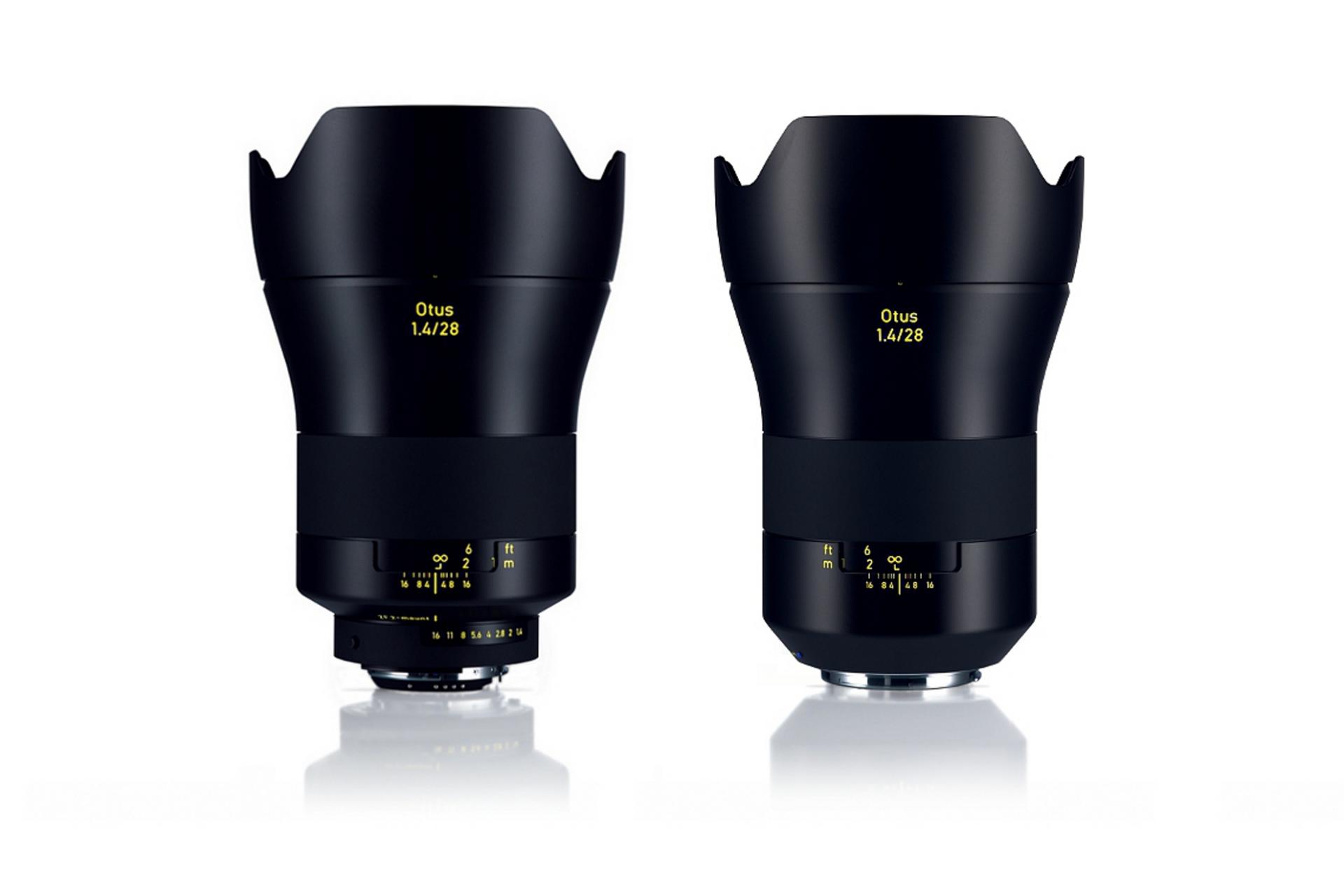 Two black ZEISS Otus 1.4/28 camera lenses with lens hoods are displayed side by side against a white background