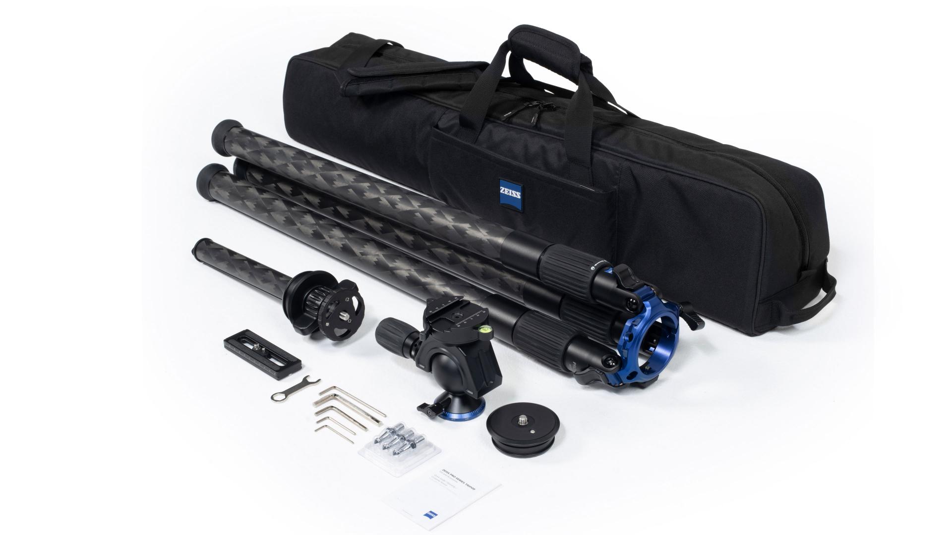 ZEISS professional carbon fiber tripod kit with detachable parts, accessories, and a padded carrying case displayed on a white background.