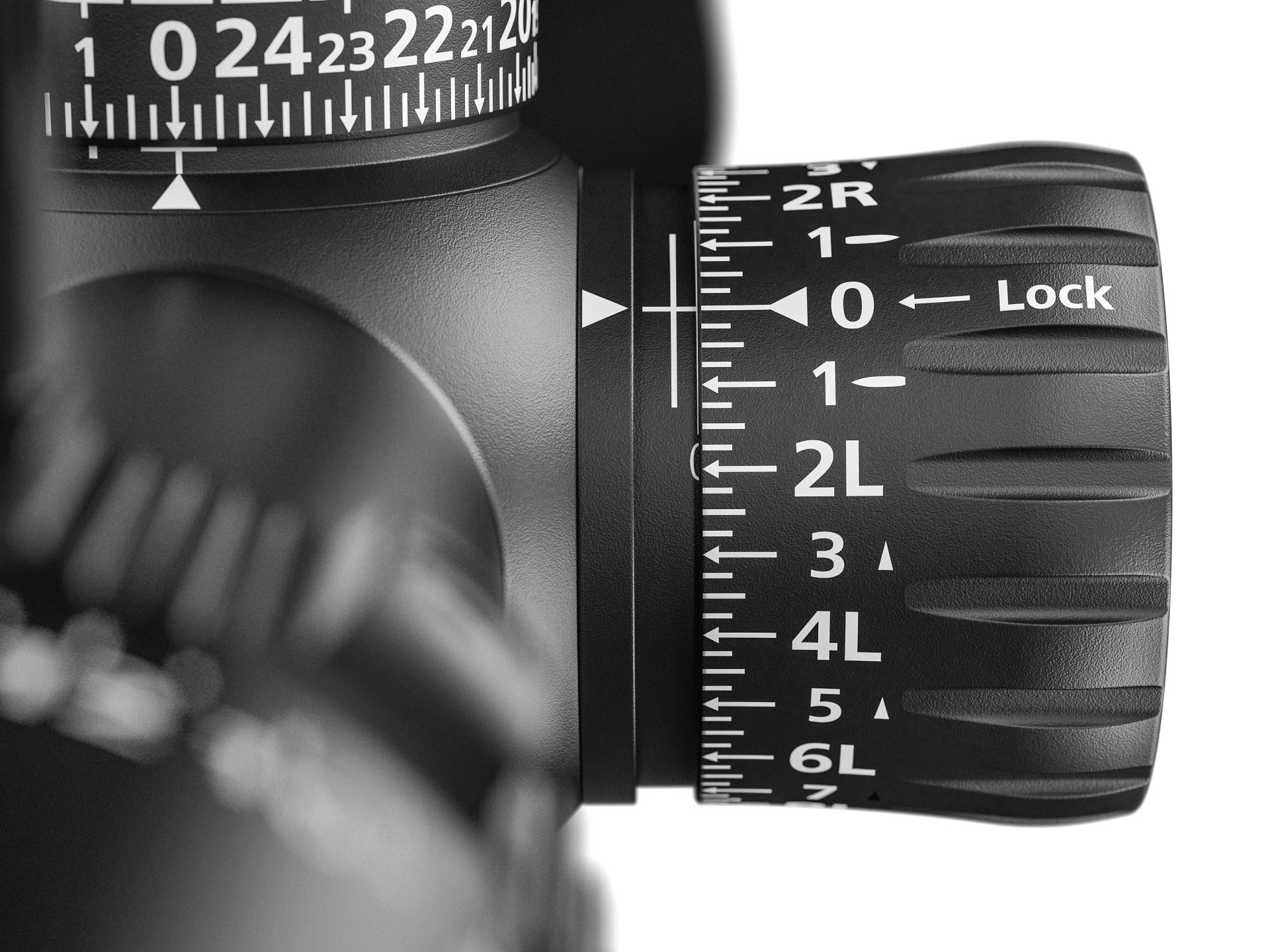 Close-up view of a precision adjustment dial with detailed numerical markings and a "Lock" label on a ZEISS optical instrument.