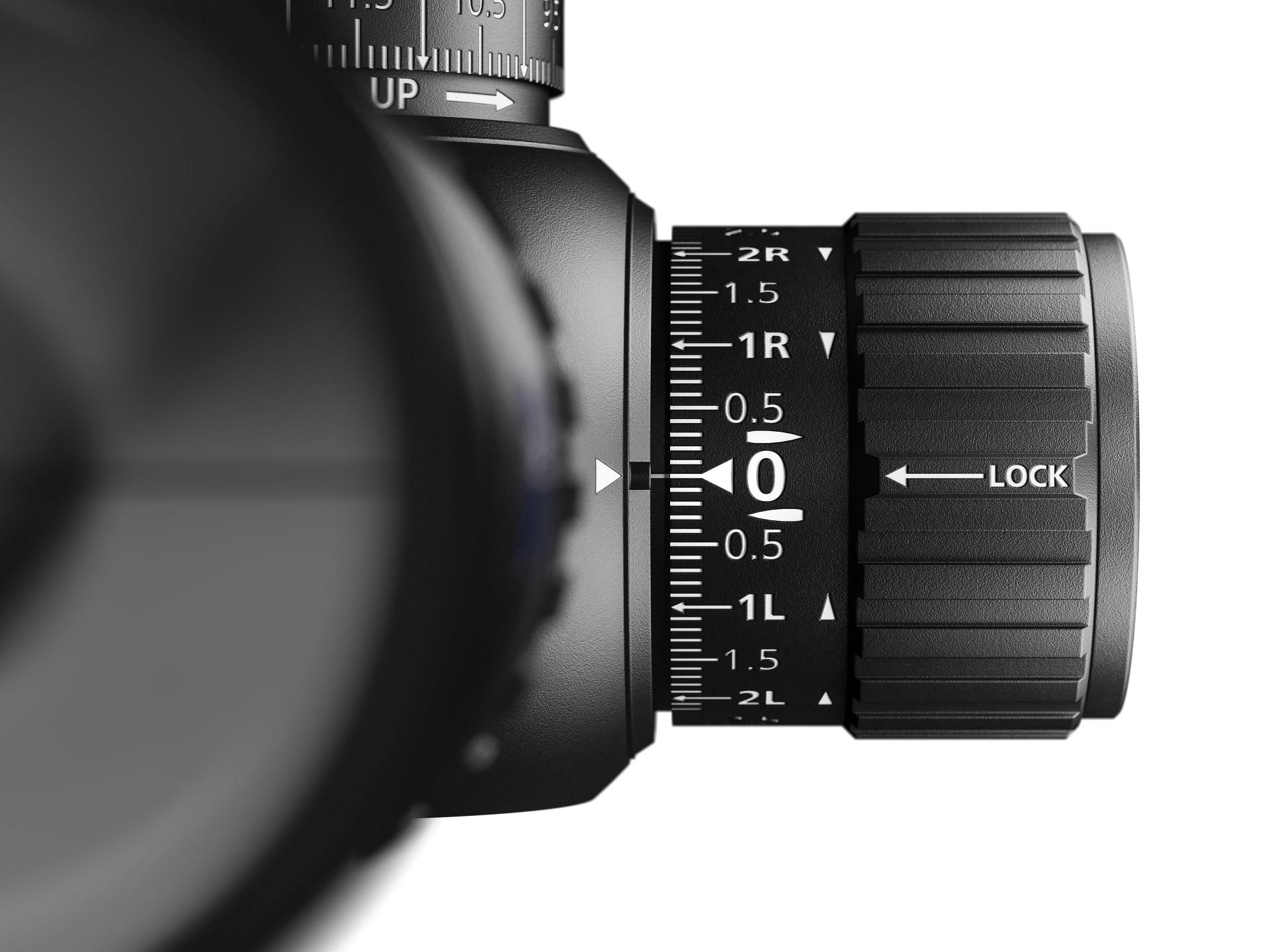 Close-up view of a precision adjustment dial with measurement markings and a locking mechanism on a ZEISS optical instrument.