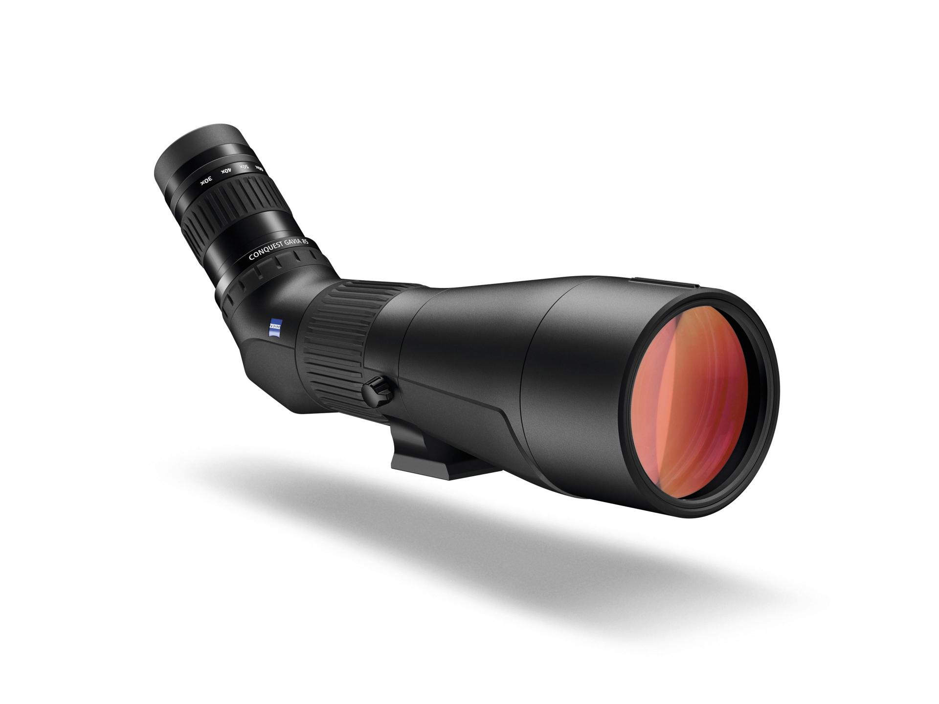 Black ZEISS binoculars with a central focusing wheel and red-tinted objective lenses displayed on a white background.