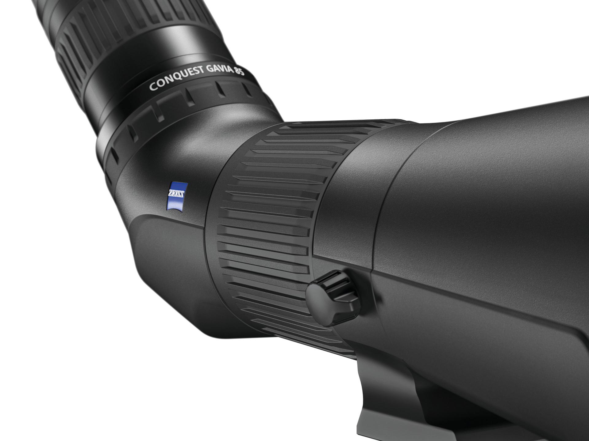 Close-up view of a black ZEISS binocular focusing wheel with the ZEISS logo clearly visible.