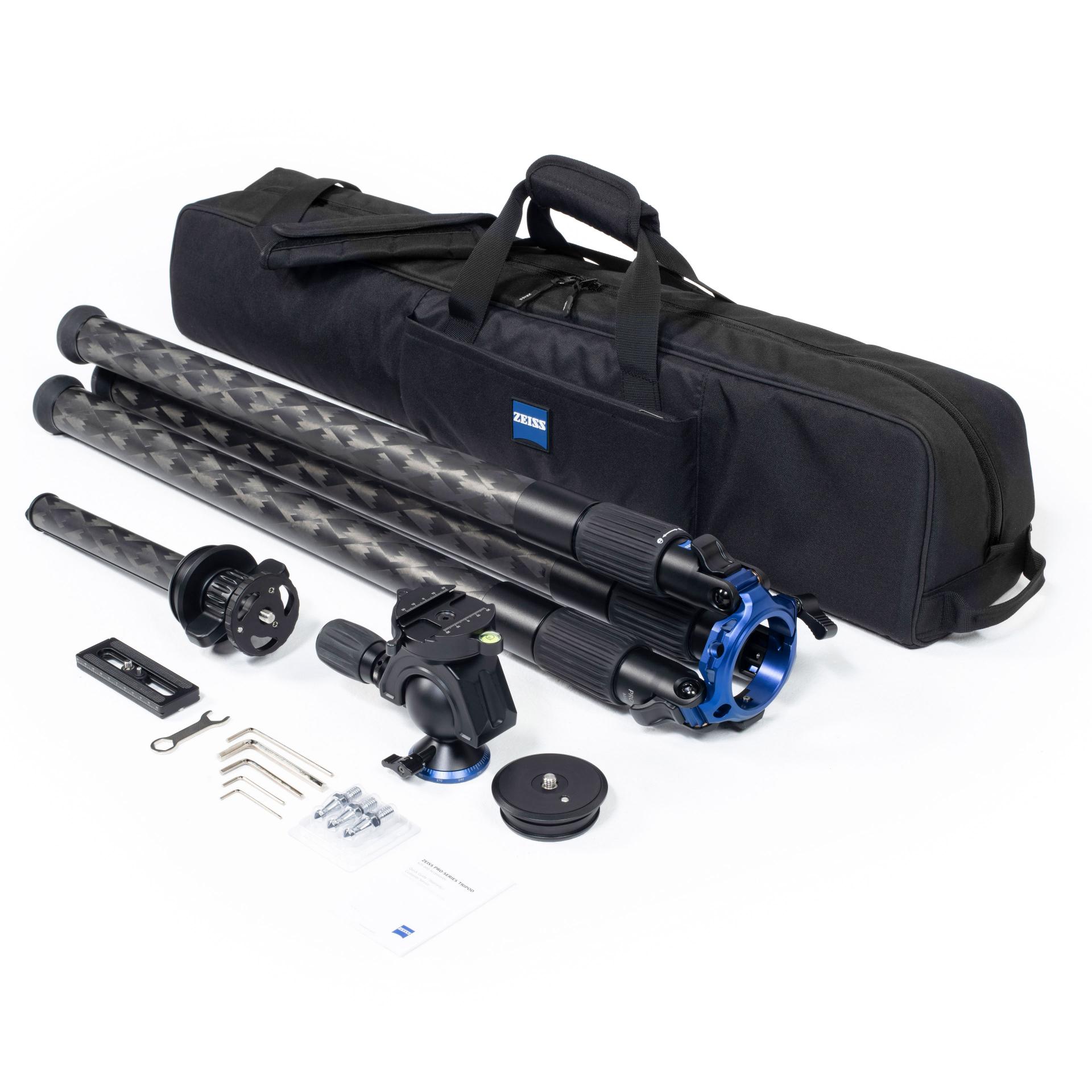 Carbon fiber tripod kit with multiple components, including a tripod head, mounting accessories, instruction manual, and a black carrying case featuring the ZEISS logo.