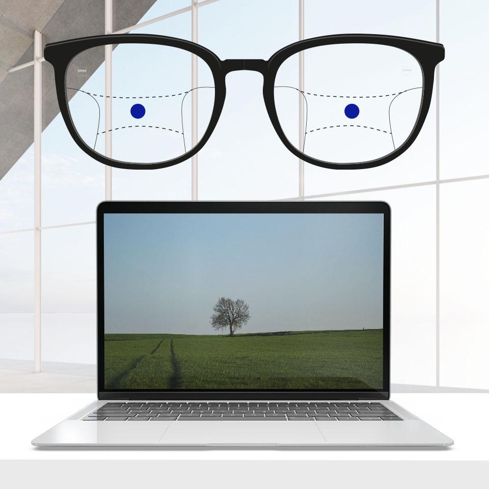 A frame with progressive lenses and schematic lines to indicate different viewing zones. Different parts of the lens are highlighted: Intermediate - middle of the glasses.