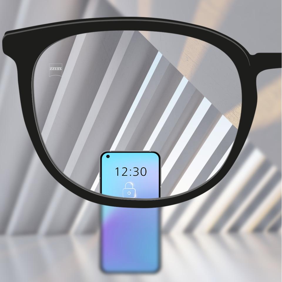 An image slider showing a conventional lens on the left, with distortions in the periphery, compared to a premium lens on the right that has clear undistorted vision throughout the lens.